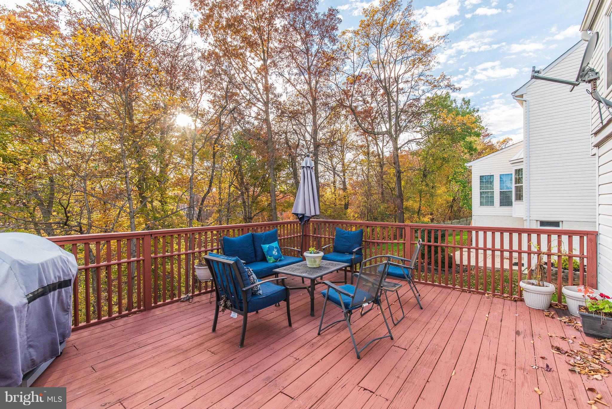 583 Henderson Road Bel Air, MD 21014 - Photo 38 of 42 a view of a deck with furniture and trees