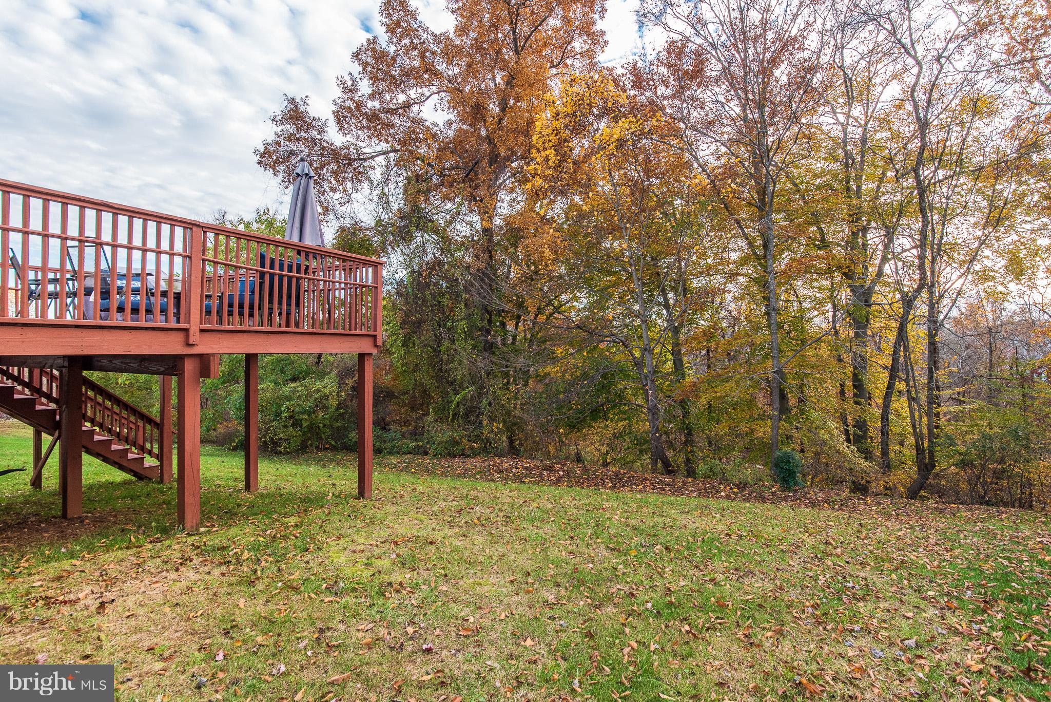 583 Henderson Road Bel Air, MD 21014 - Photo 42 of 42 a backyard of a house with table and chairs
