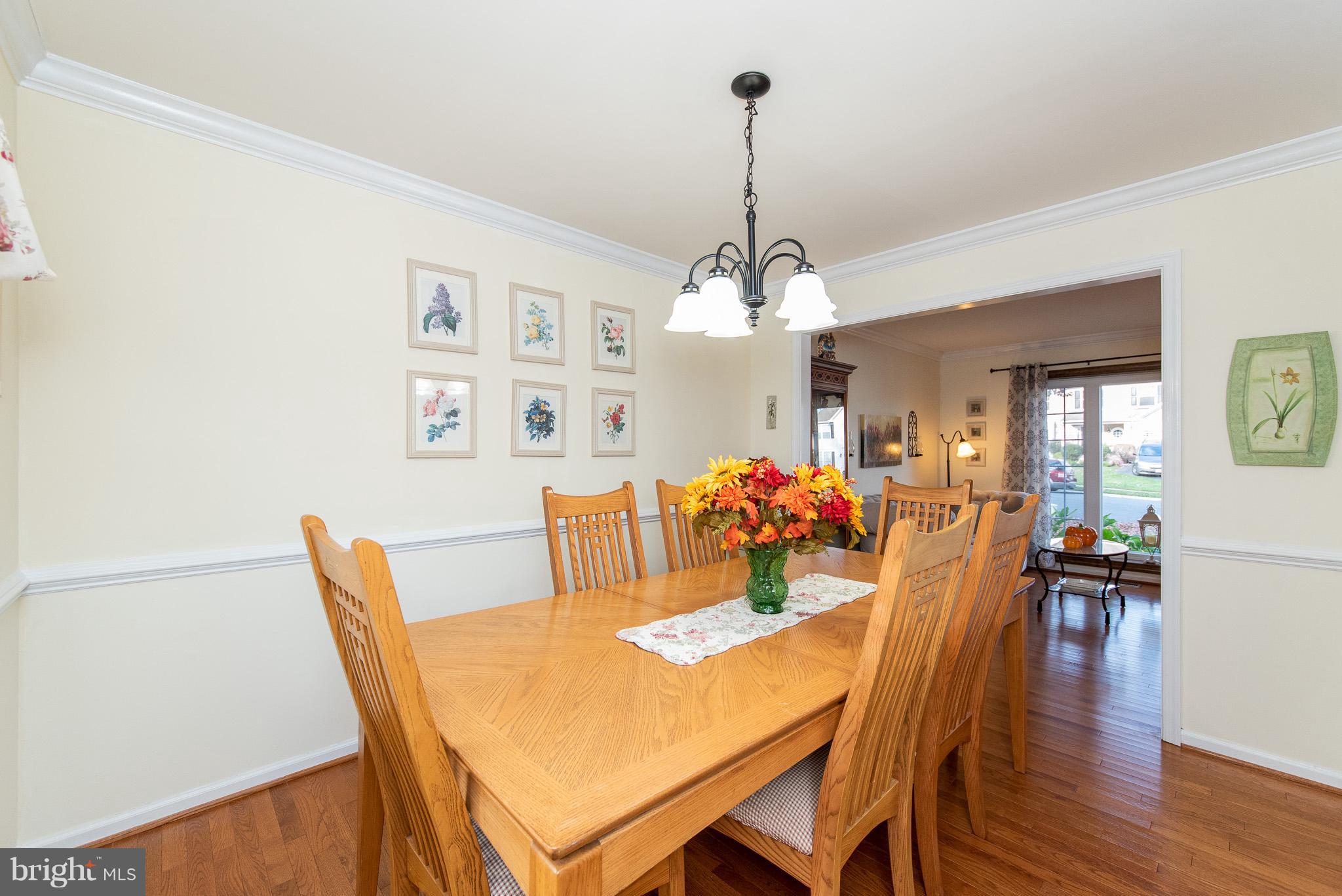 583 Henderson Road Bel Air, MD 21014 - Photo 7 of 42 a view of a dining room with furniture and wooden floor