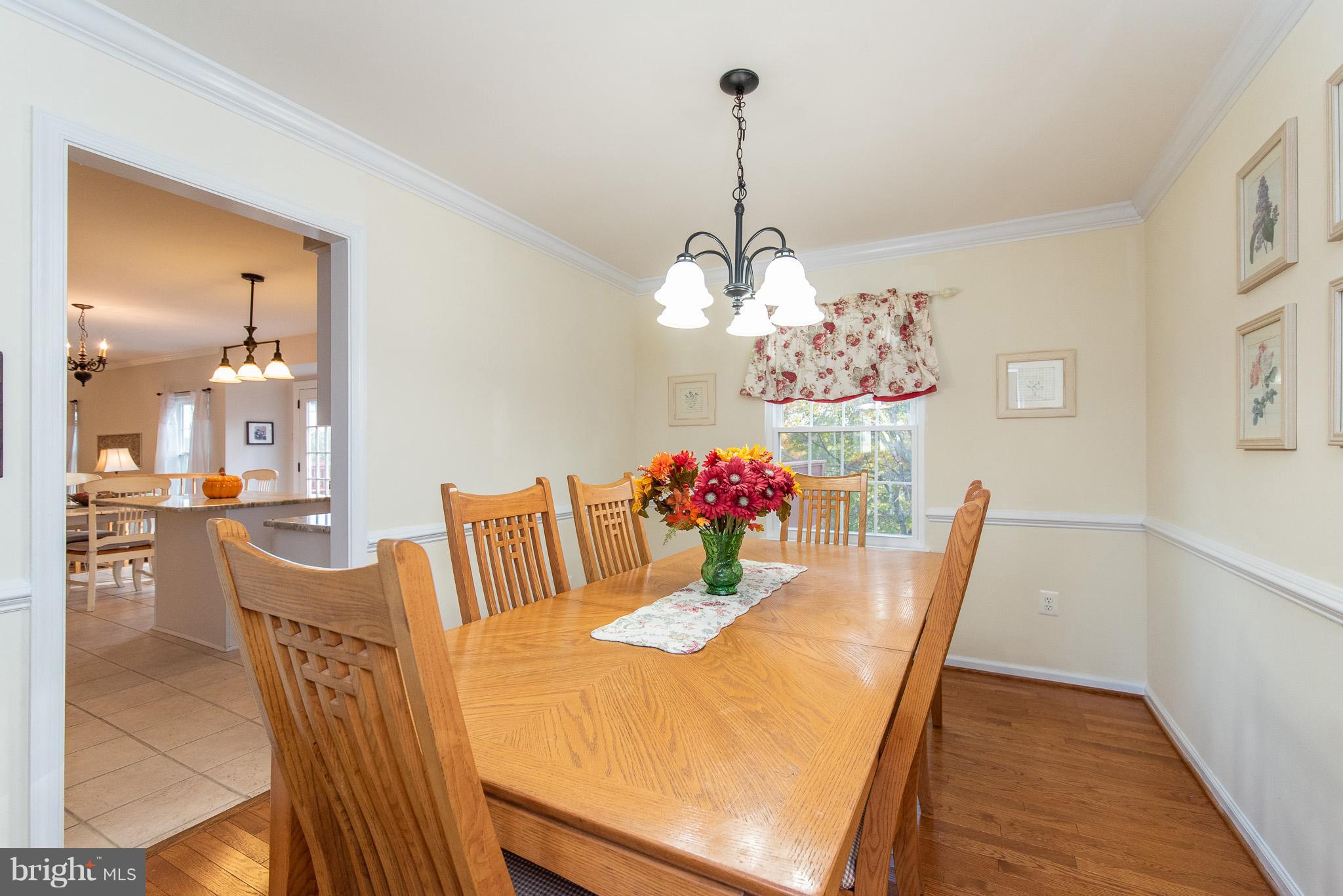 583 Henderson Road Bel Air, MD 21014 - Photo 8 of 42 a view of a dining room with furniture and chandelier