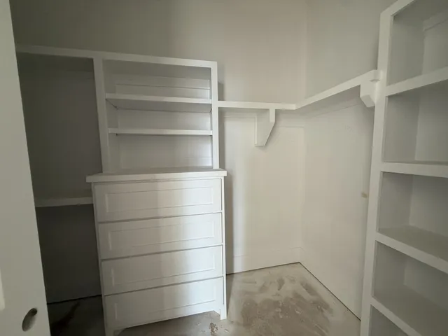 a view of staircase with rug floor