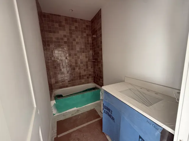 a view of a building with a street