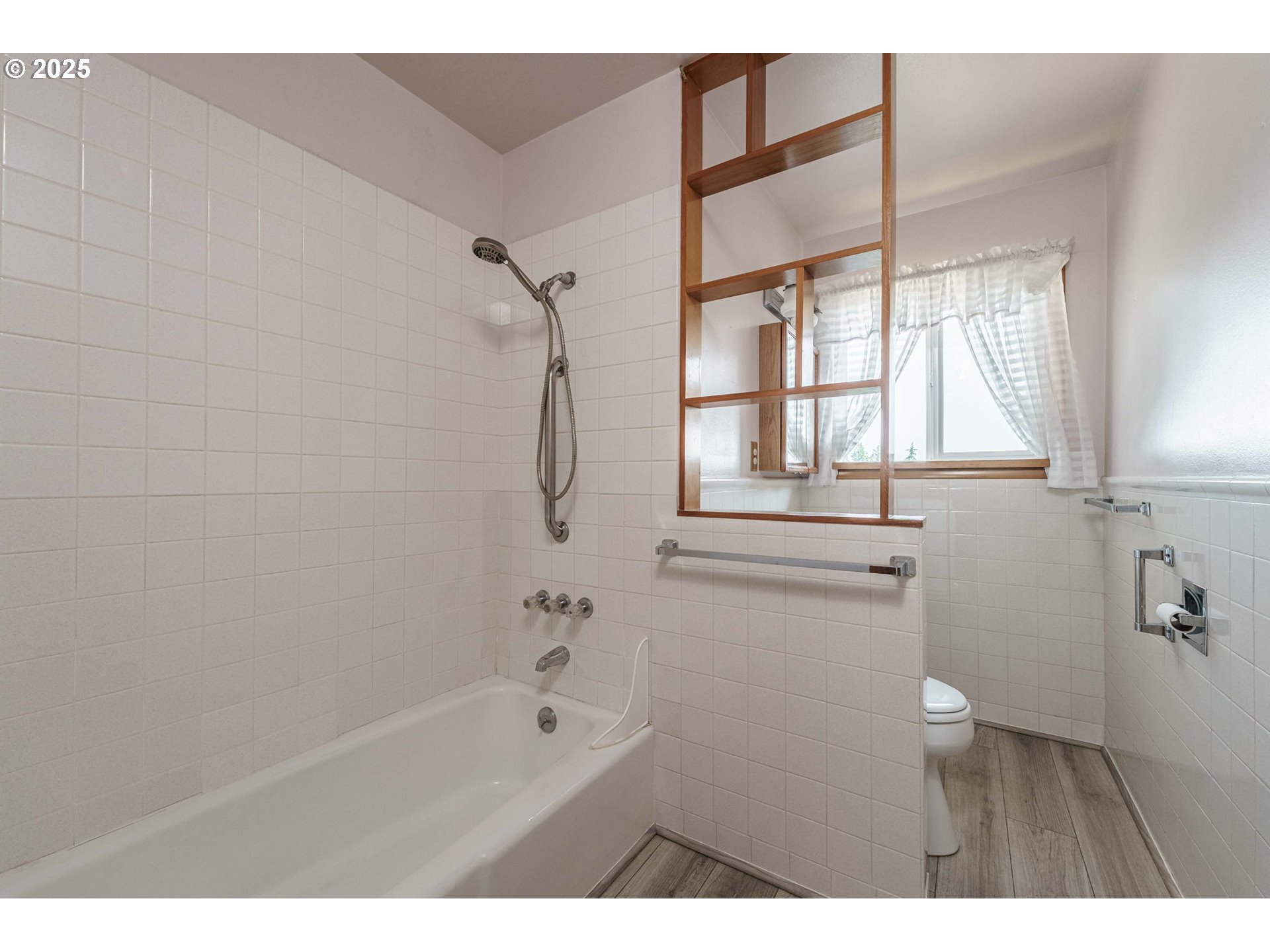1938 Northwest Sierra Lane Camas, WA 98607 - Photo 21 of 33 a bathroom with a bathtub shower and a sink