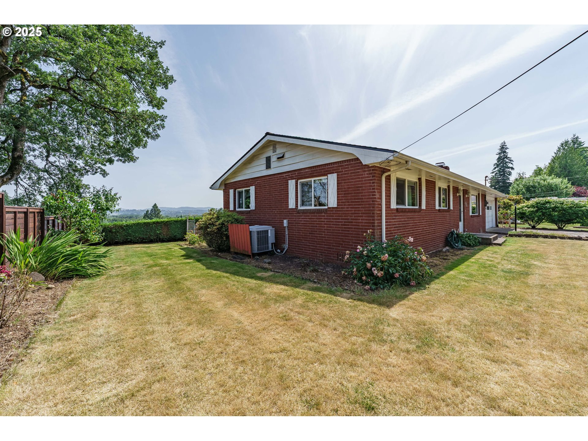 1938 Northwest Sierra Lane Camas, WA 98607 - Photo 4 of 33 a front view of a house with garden