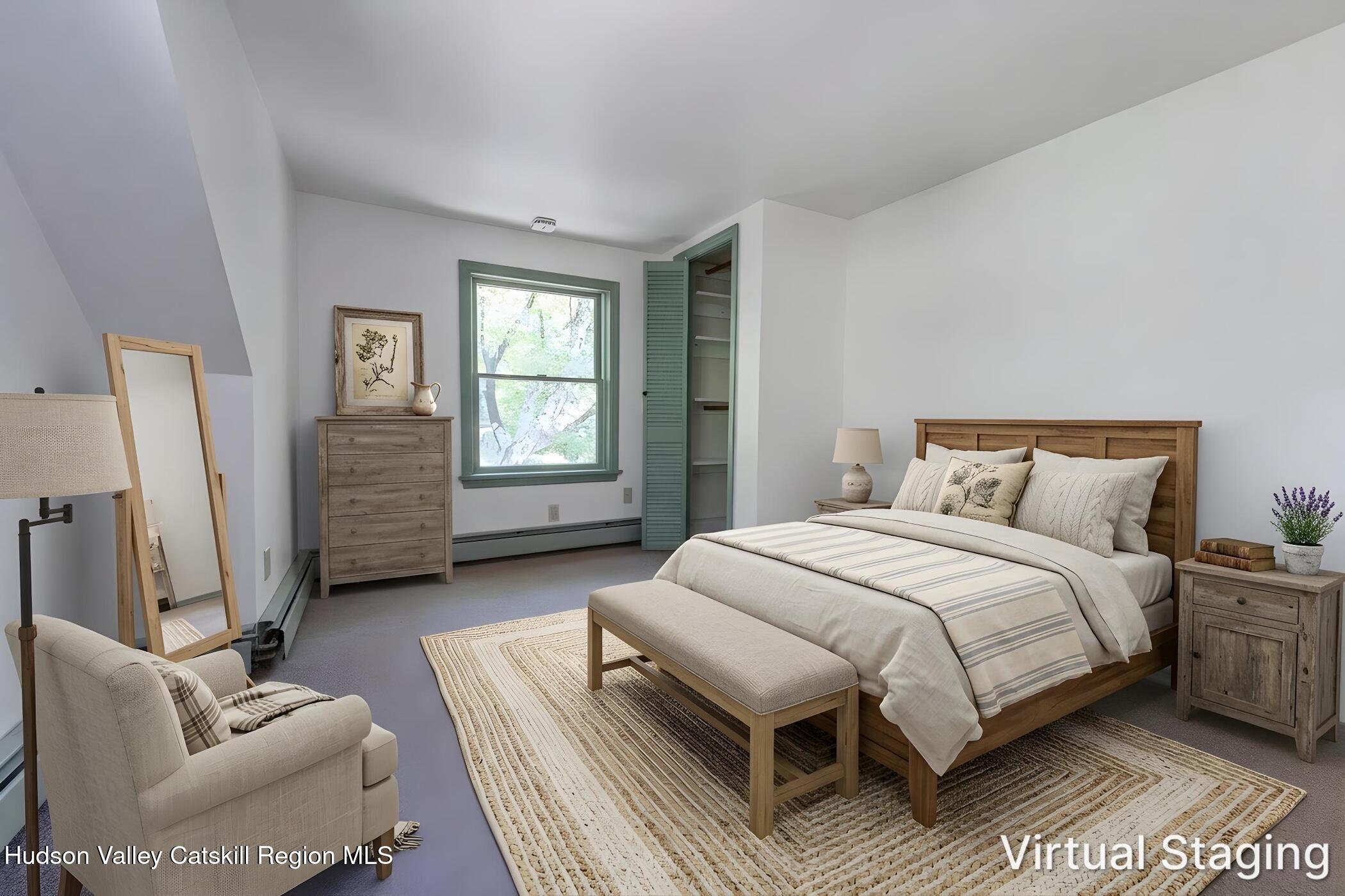 4533 Atwood Road Stone Ridge, NY 12484 - Photo 36 of 63 a bedroom with a bed couch and windows