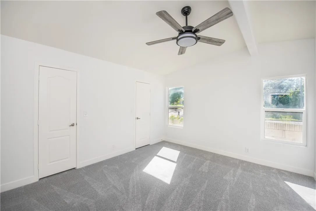 1051 Site, Unit 31 Brea, CA 92821 - Photo 19 of 35 a view of empty room with window and ceiling fan