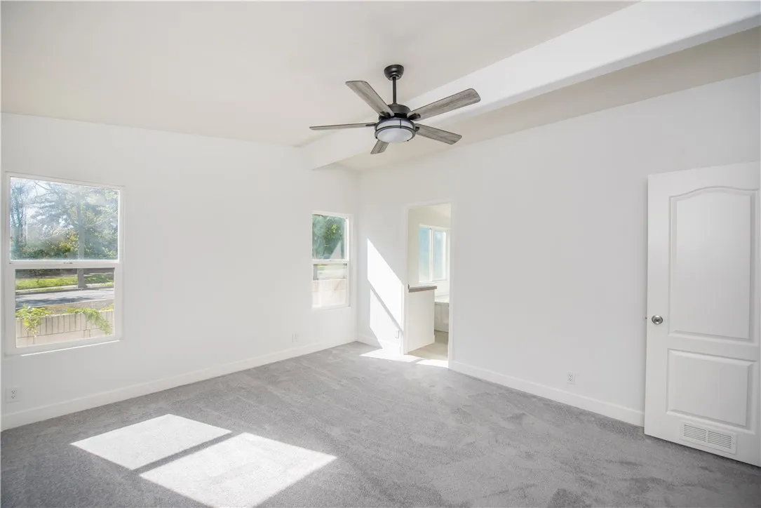 1051 Site, Unit 31 Brea, CA 92821 - Photo 20 of 35 an empty room with windows and fan