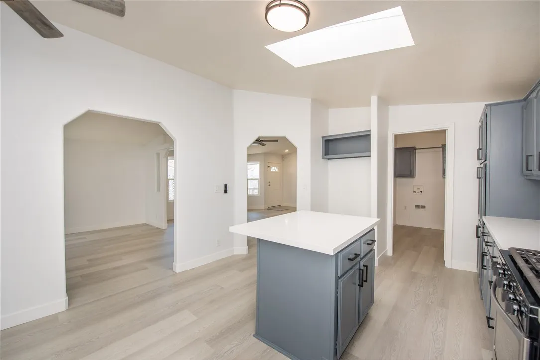 1051 Site, Unit 31 Brea, CA 92821 - Photo 9 of 35 a room with wooden floor and entrance