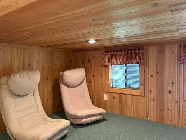 a room with furniture and a window