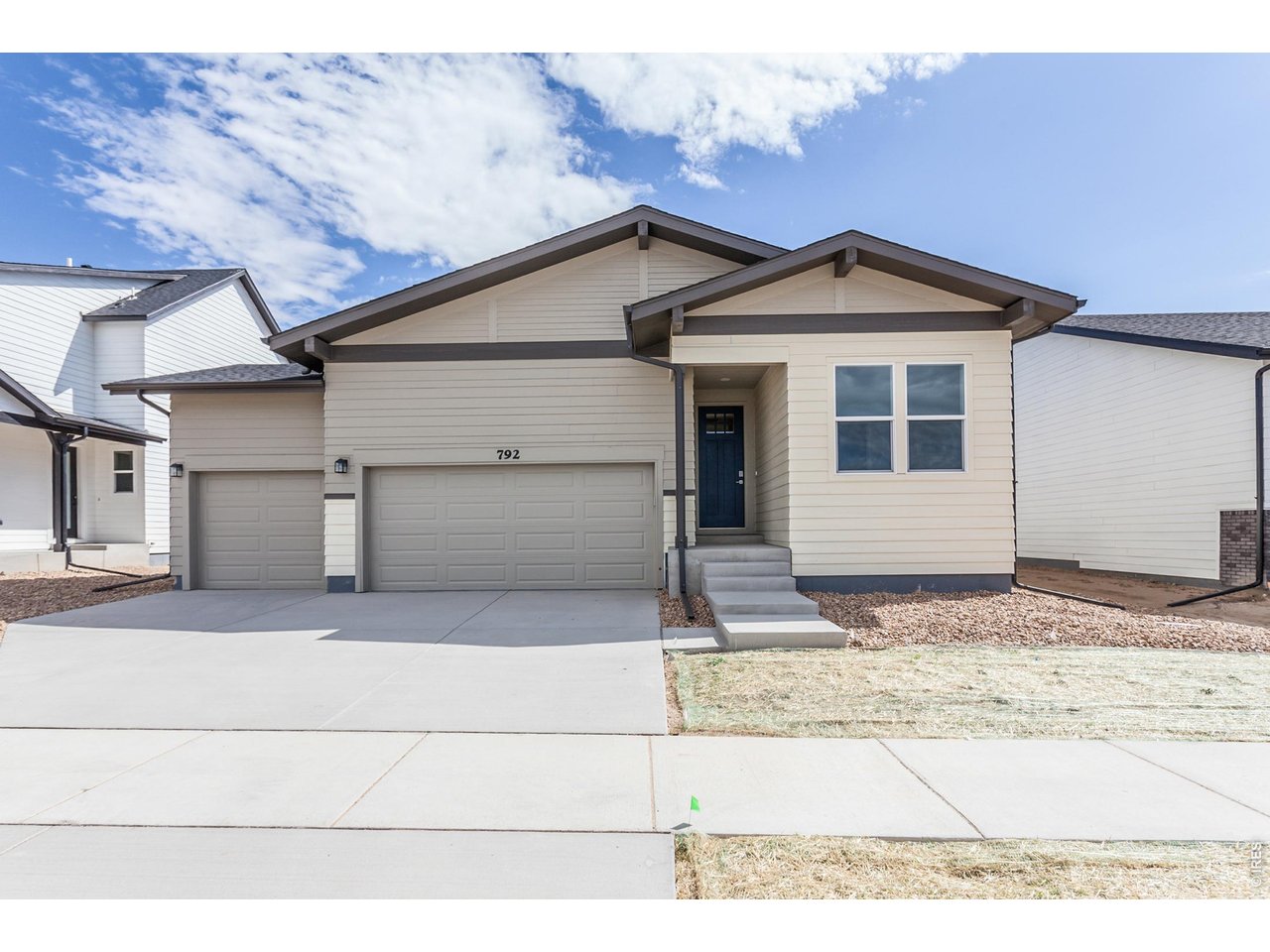 792 Chatter Road Windsor, CO 80550 - Photo 3 of 49 a view of a white house