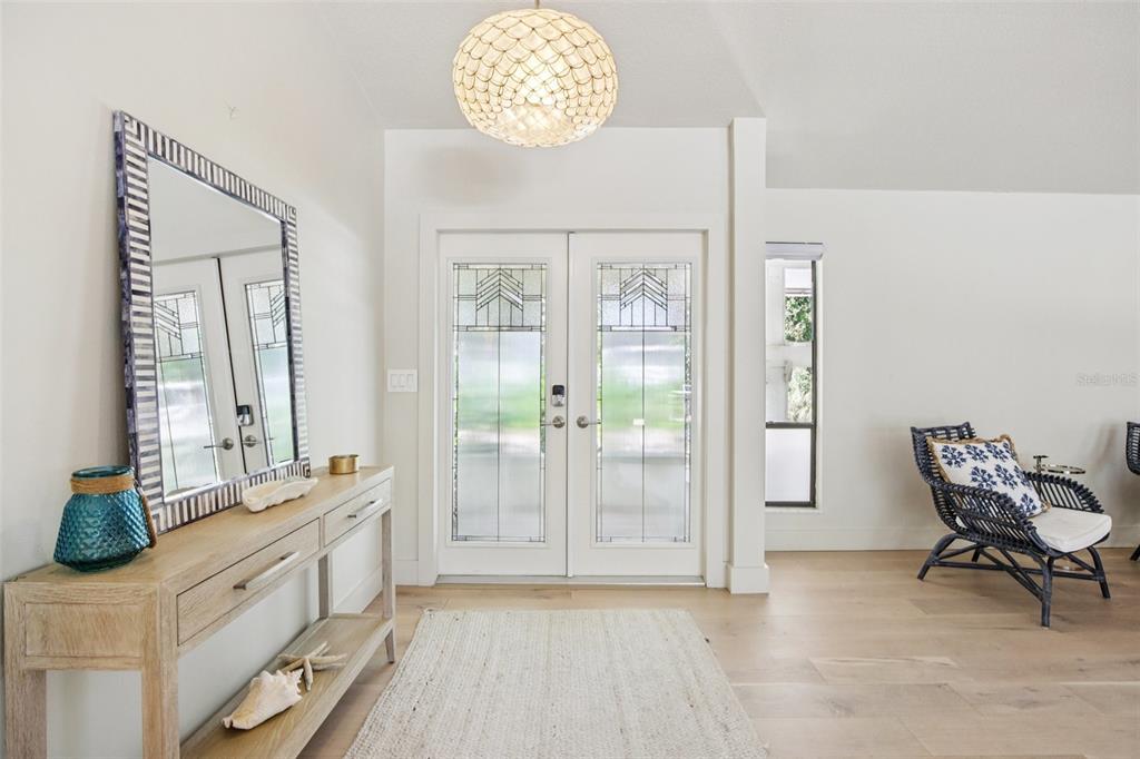 3390 Bayou Sound Longboat Key, FL 34228 - Photo 14 of 59 a spacious bathroom with a double vanity sink and a mirror