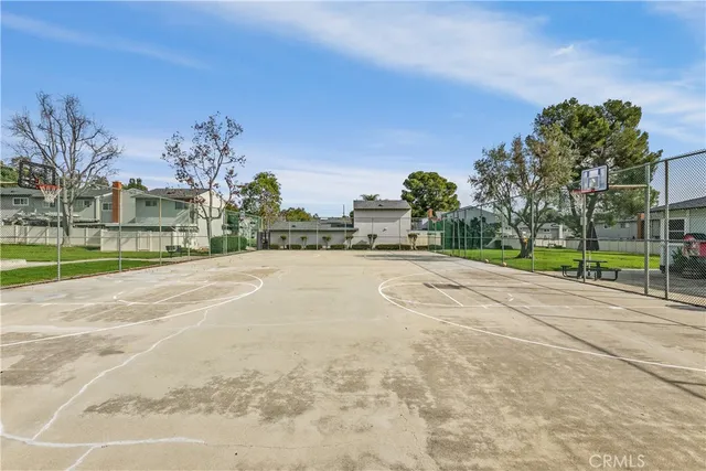 a view of an outdoor space and tennis court