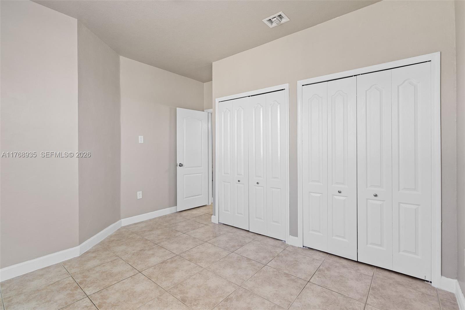 2731 Southeast 17th Avenue, Unit 211 Homestead, FL 33035 - Photo 21 of 26 a view of an empty room