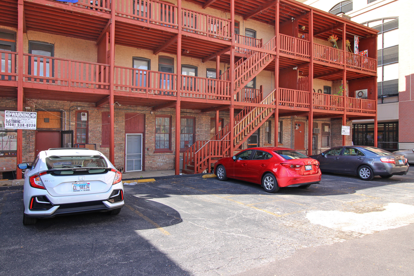 125 North Addison Avenue, Unit 3 Elmhurst, IL 60126 - Photo 15 of 16 a car parked in front of a building