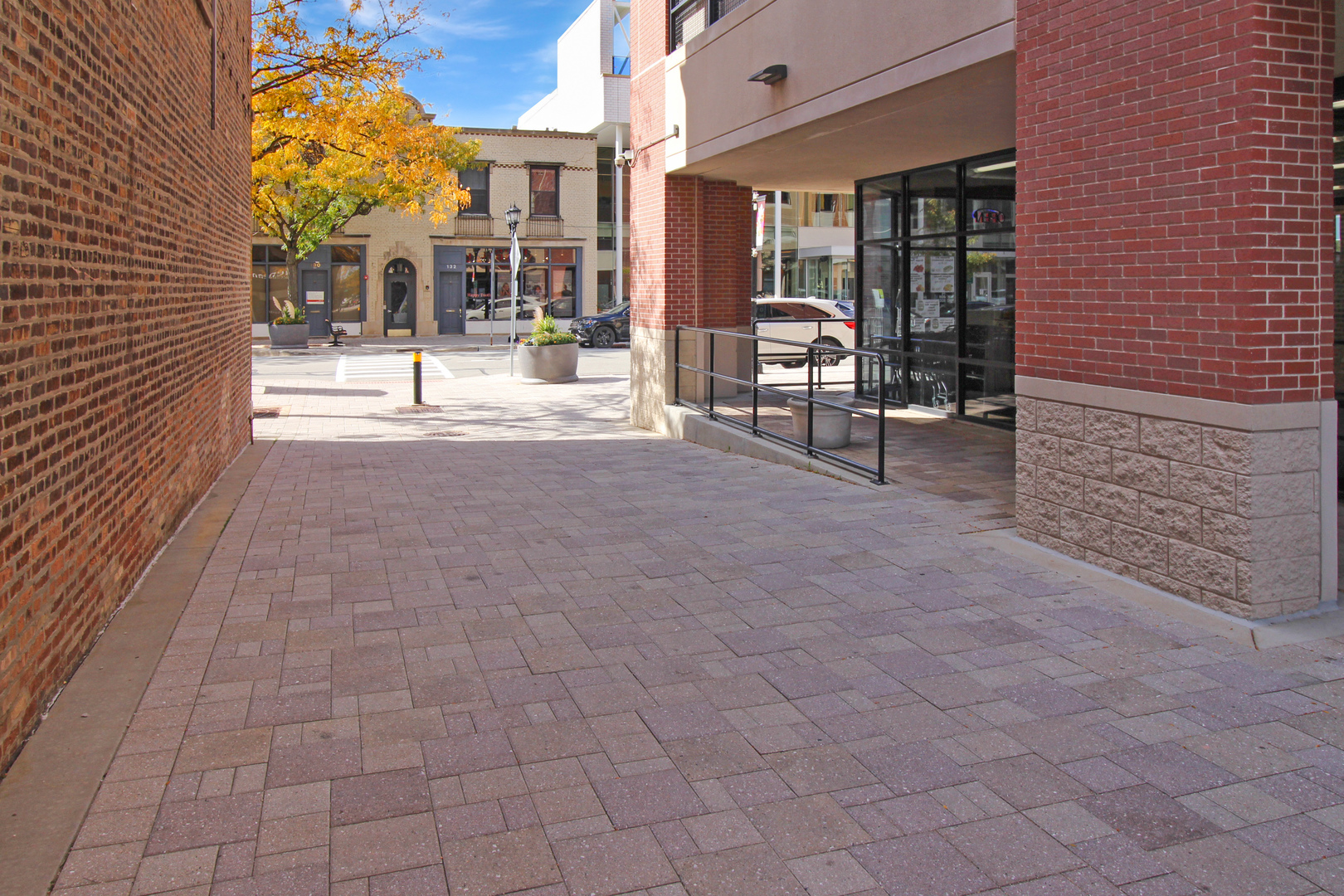 125 North Addison Avenue, Unit 3 Elmhurst, IL 60126 - Photo 3 of 16 a view of a building with sitting area