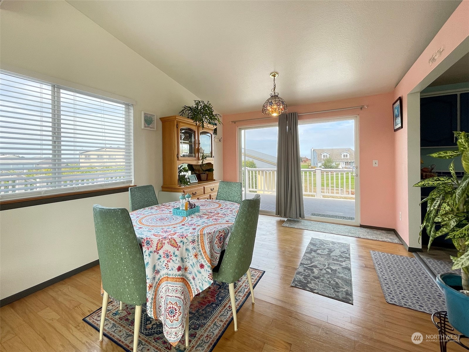 190 Greywolf Road Sequim, WA 98382 - Photo 12 of 40 a view of a dining room with furniture window and wooden floor