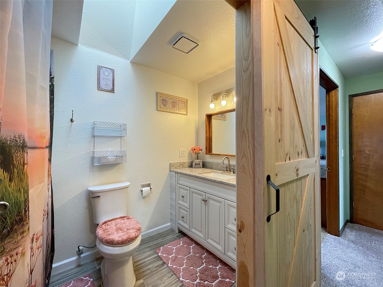 190 Greywolf Road Sequim, WA 98382 - Photo 17 of 40 a bathroom with a granite countertop sink toilet and shower