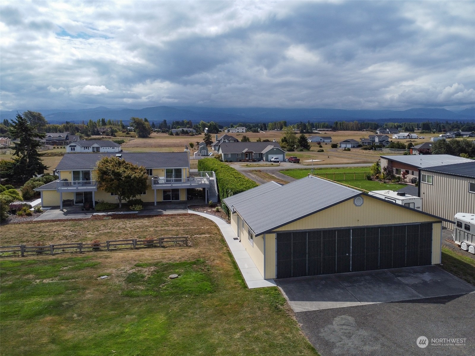 190 Greywolf Road Sequim, WA 98382 - Photo 2 of 40 a view of a terrace with a garden
