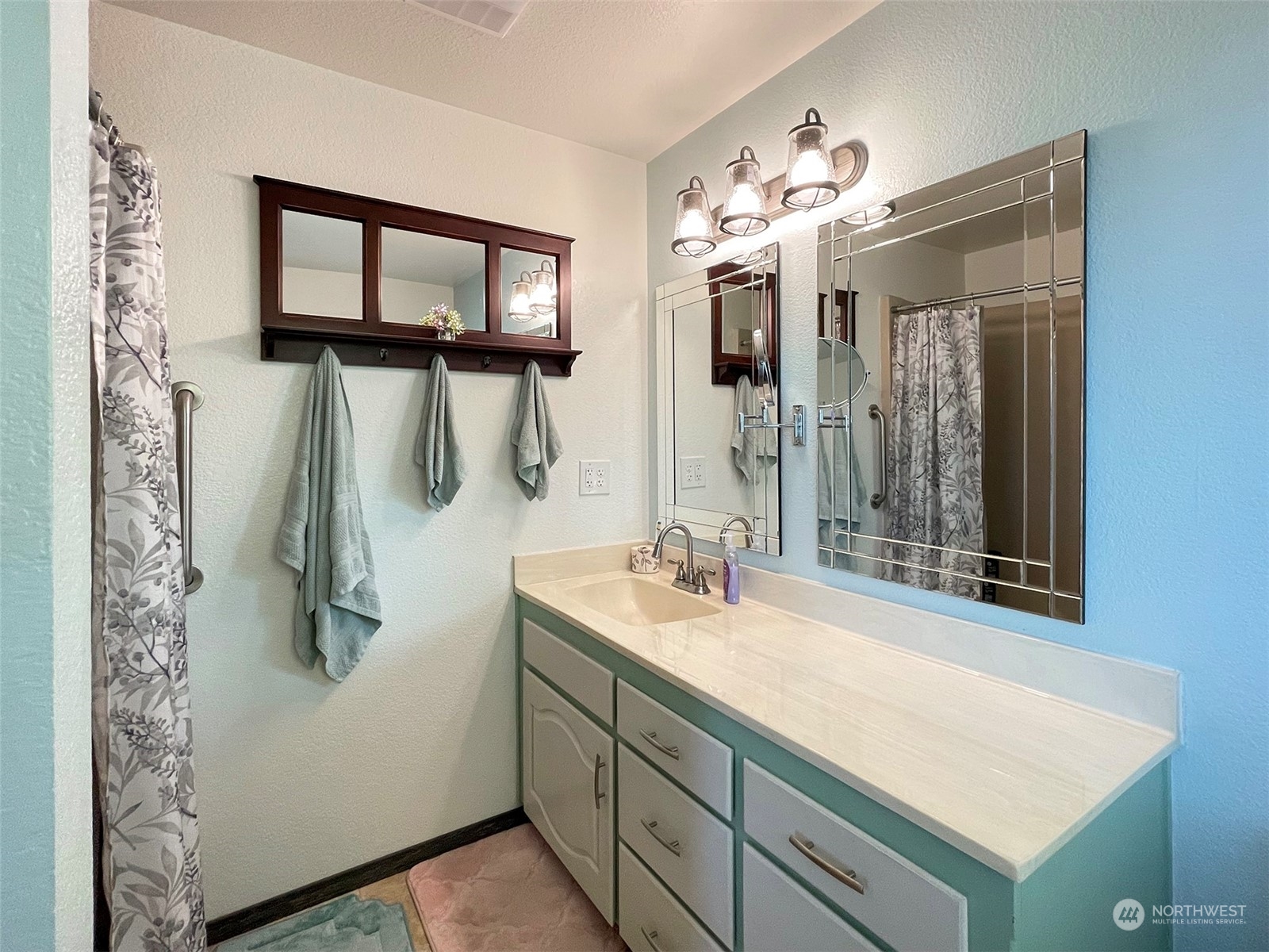 190 Greywolf Road Sequim, WA 98382 - Photo 23 of 40 a bathroom with a sink vanity and mirror