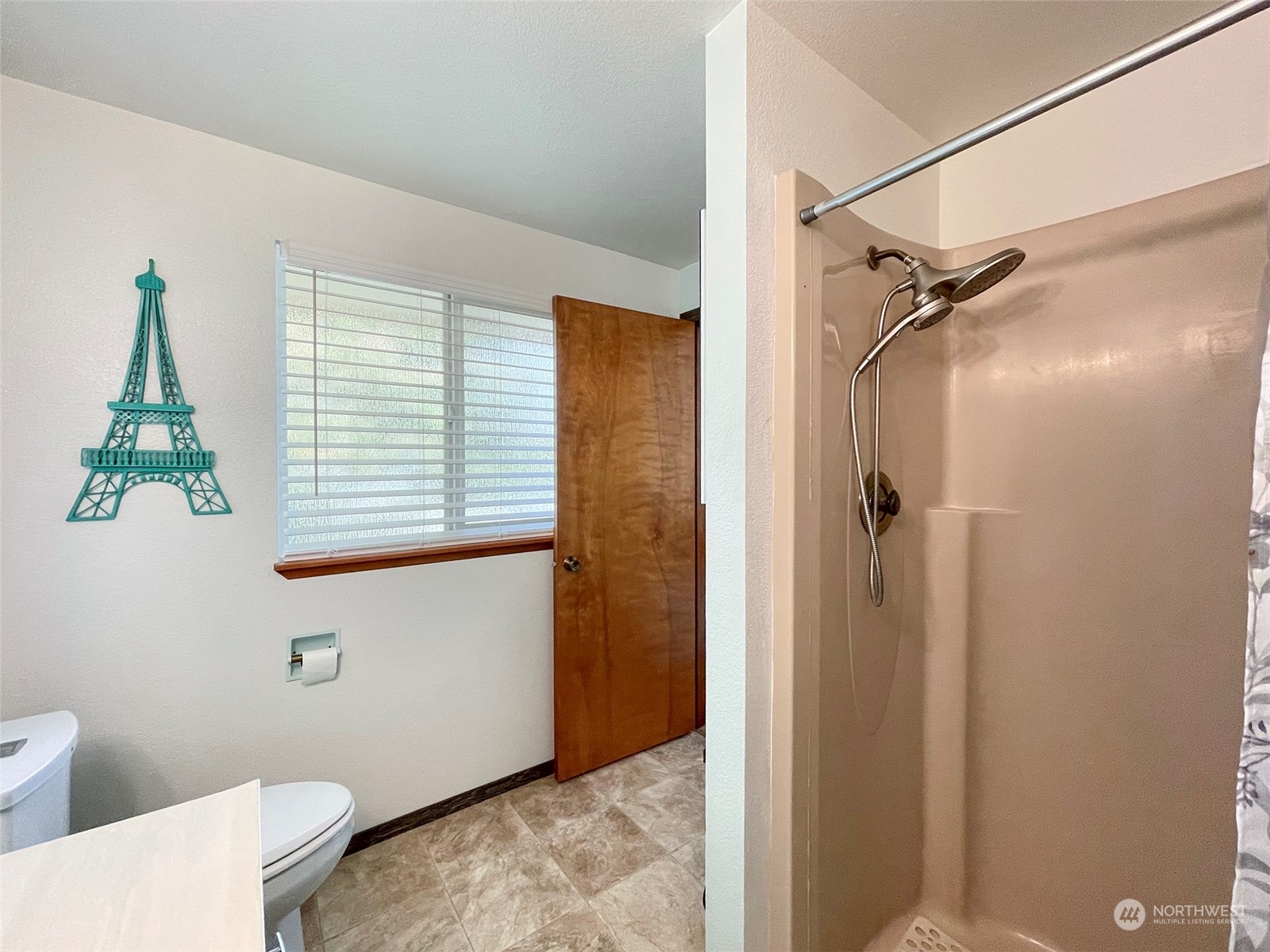 190 Greywolf Road Sequim, WA 98382 - Photo 24 of 40 a bathroom with a window and a shower