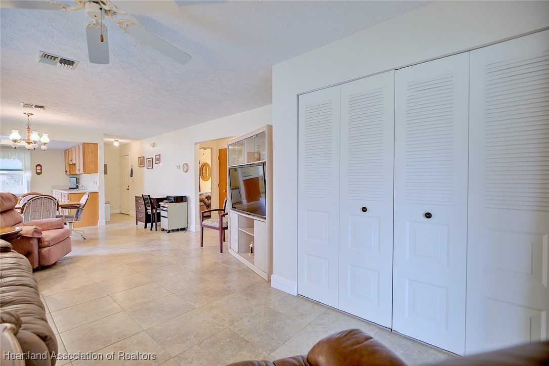 1815 Key Lake Drive Sebring, FL 33875 - Photo 15 of 41 a view of a livingroom with furniture and a window