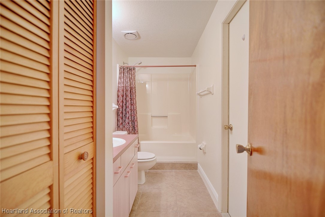 1815 Key Lake Drive Sebring, FL 33875 - Photo 26 of 41 a bathroom with a shower and a toilet