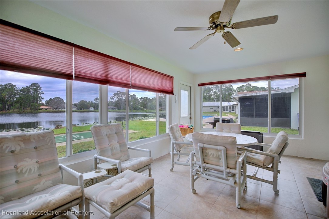 1815 Key Lake Drive Sebring, FL 33875 - Photo 29 of 41 a work room with large windows and a table