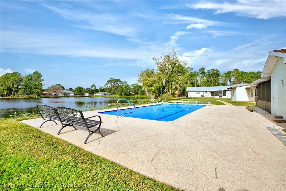 1815 Key Lake Drive Sebring, FL 33875 - Photo 33 of 41 a park view with a bench and lake view