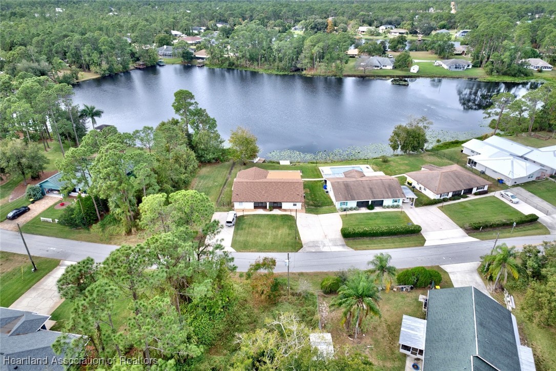 1815 Key Lake Drive Sebring, FL 33875 - Photo 36 of 41 an aerial view of residential house with outdoor space and lake view