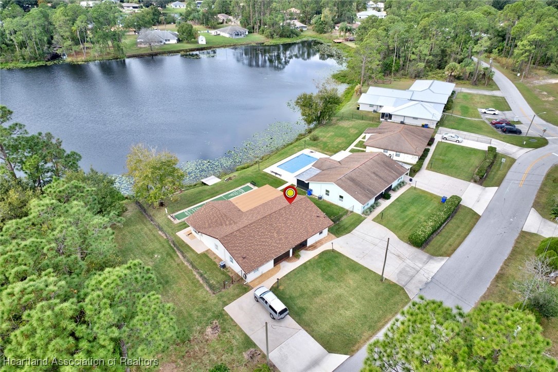 1815 Key Lake Drive Sebring, FL 33875 - Photo 37 of 41 an aerial view of a house with a garden and lake view