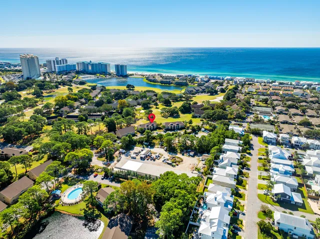 a view of a swimming pool with an outdoor seating