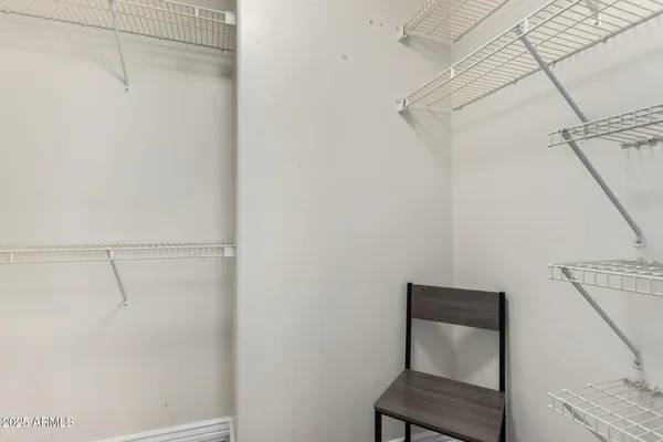 a view of a room with racks on the wall