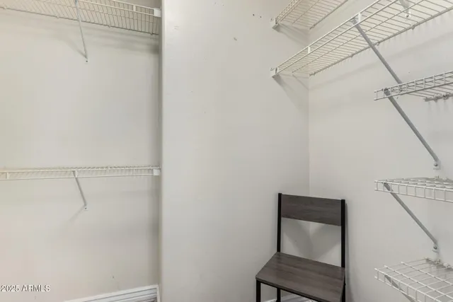 a view of a room with racks on the wall