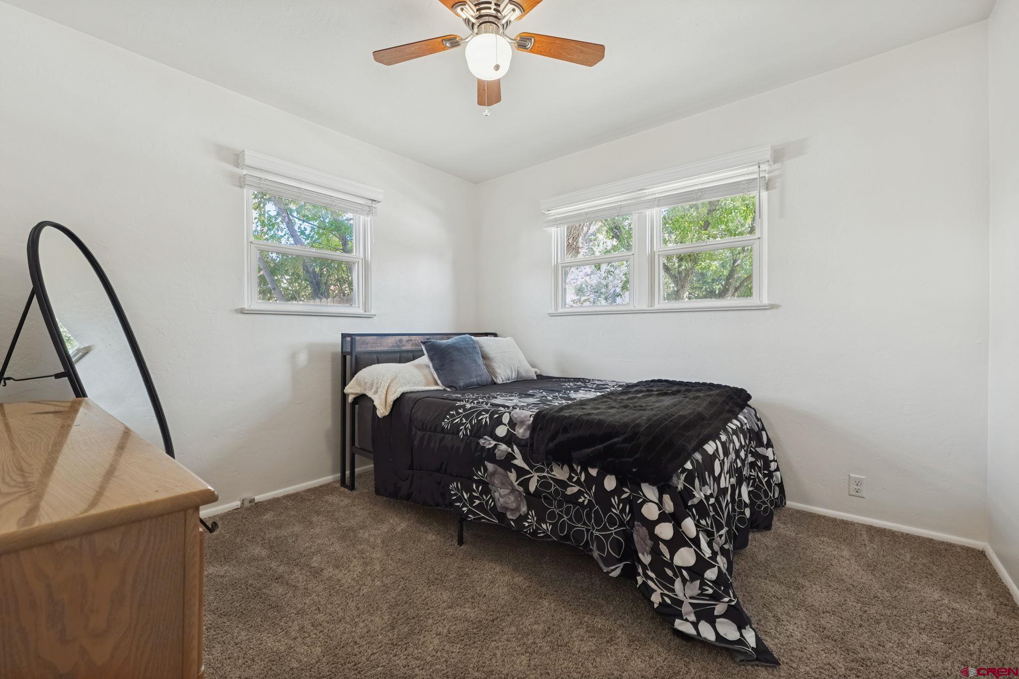2807 Junction Street Durango, CO 81301 - Photo 16 of 26 a bedroom with a bed and a window