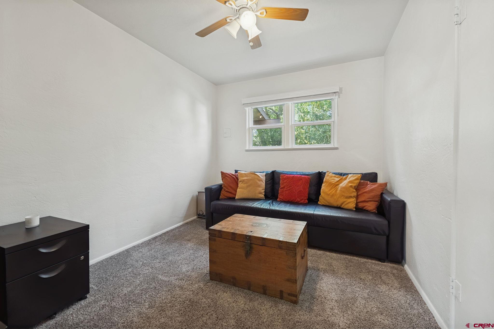 2807 Junction Street Durango, CO 81301 - Photo 17 of 26 a living room with furniture and a window