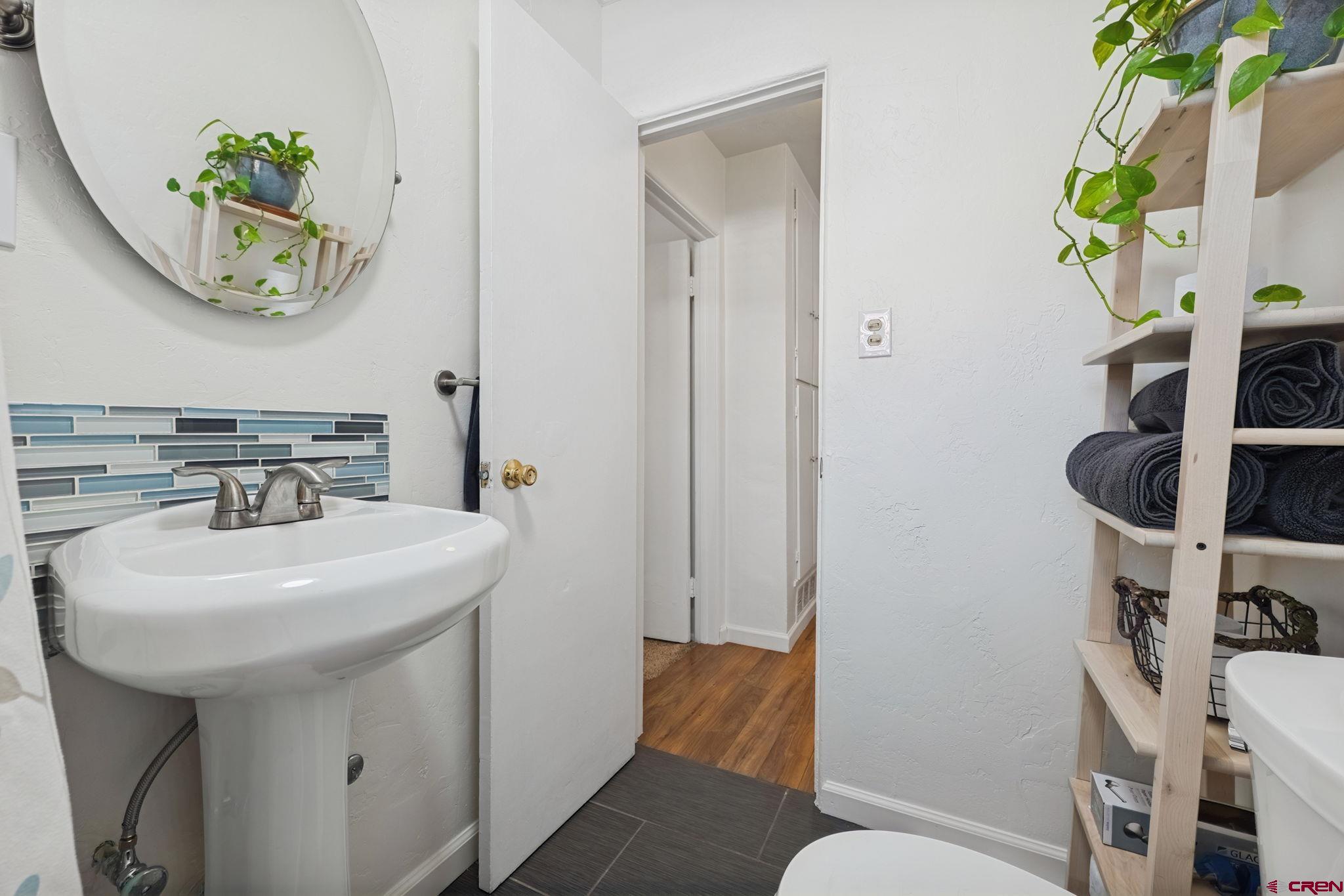2807 Junction Street Durango, CO 81301 - Photo 18 of 26 a bathroom with a sink and toilet