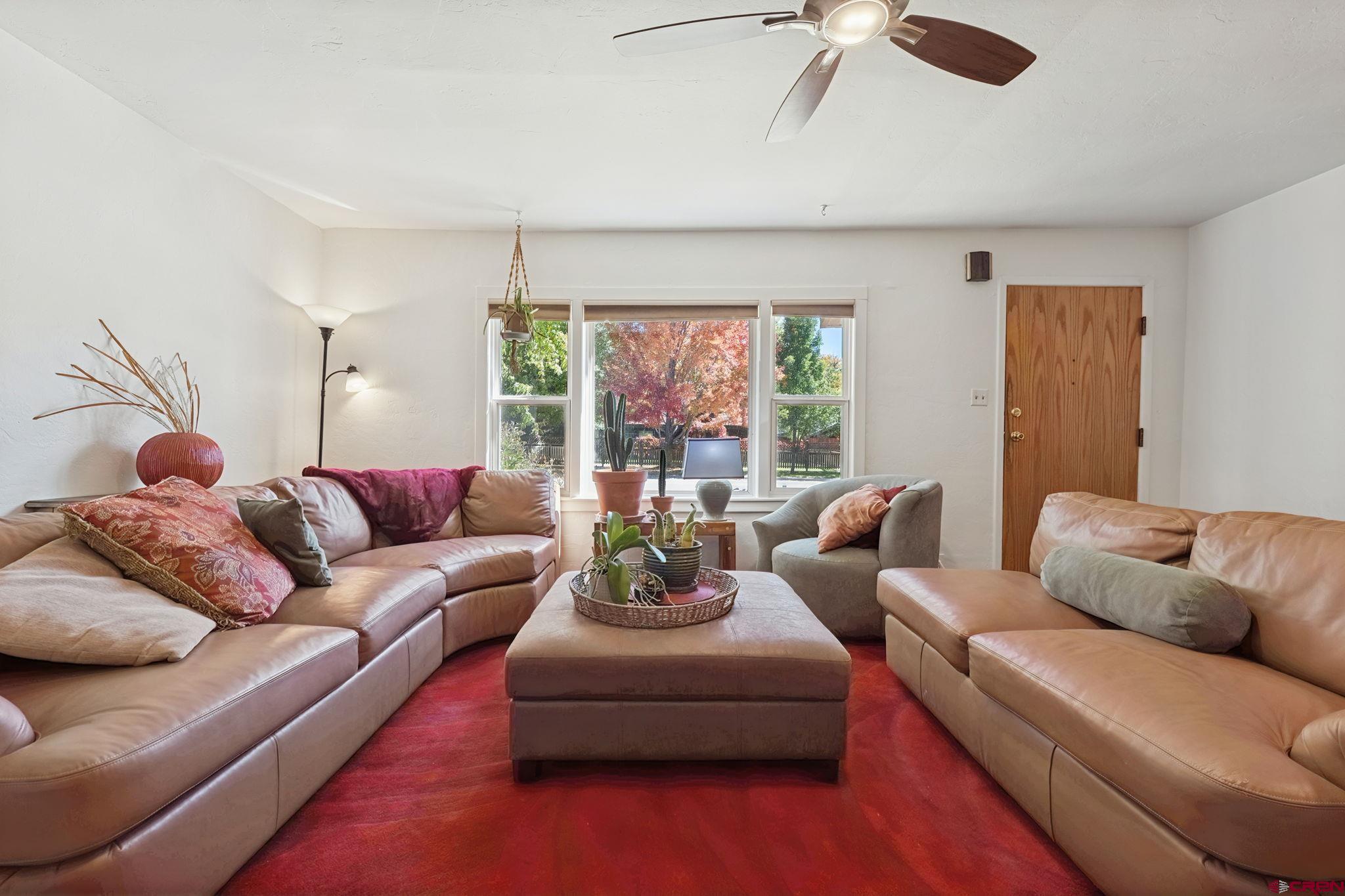 2807 Junction Street Durango, CO 81301 - Photo 3 of 26 a living room with furniture and a large window