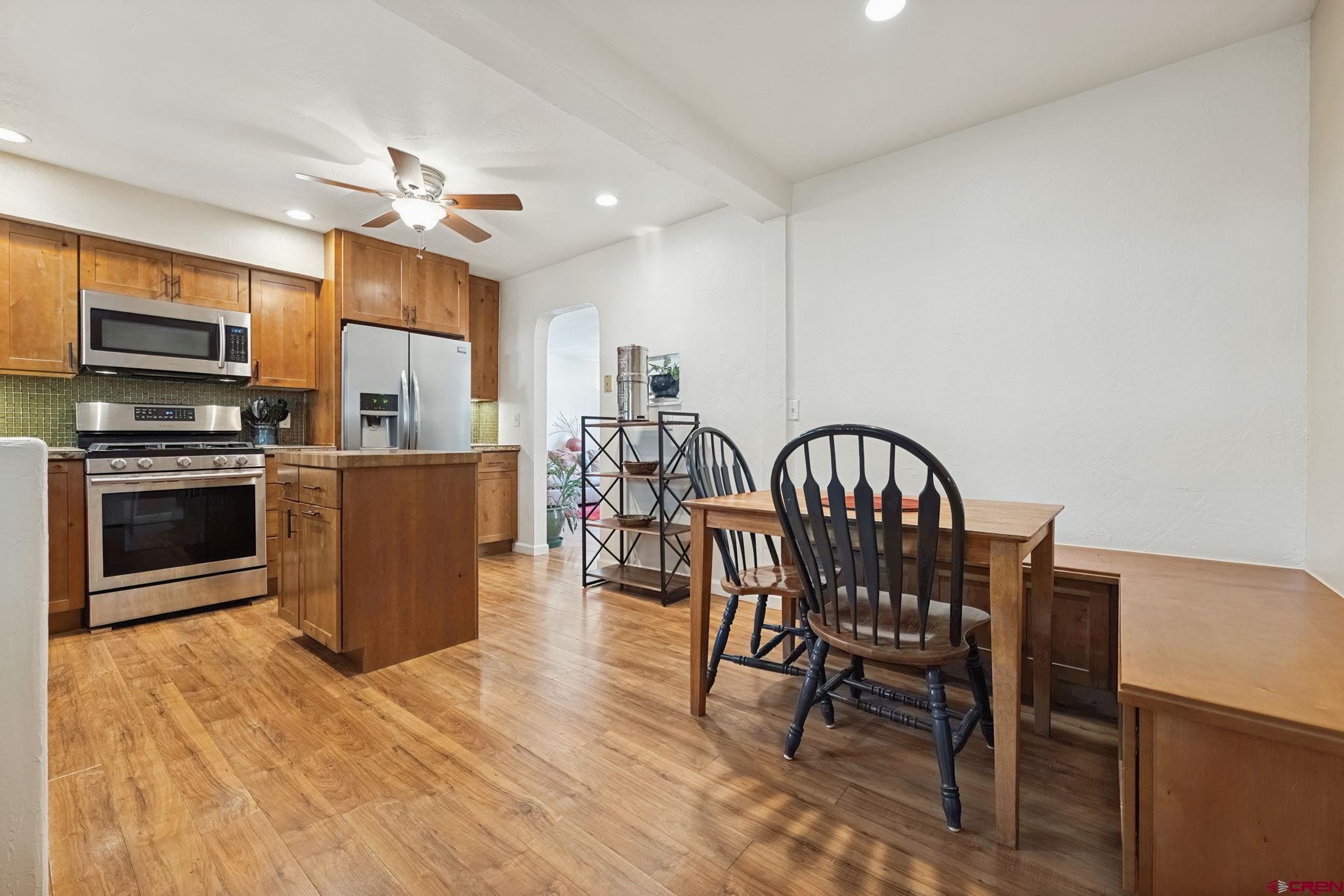 2807 Junction Street Durango, CO 81301 - Photo 8 of 26 a view of a dining room with furniture wooden floor and chandelier