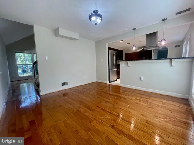 a view of a livingroom with a furniture
