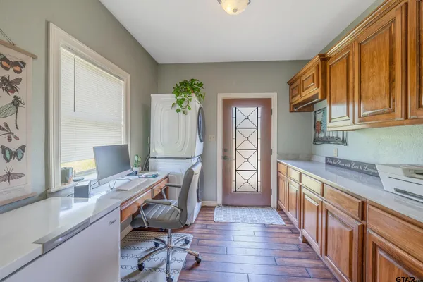 a room with furniture and a window