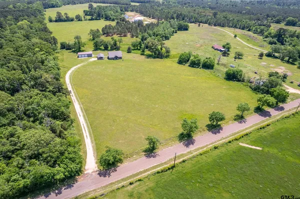 an aerial view of a swimming pool
