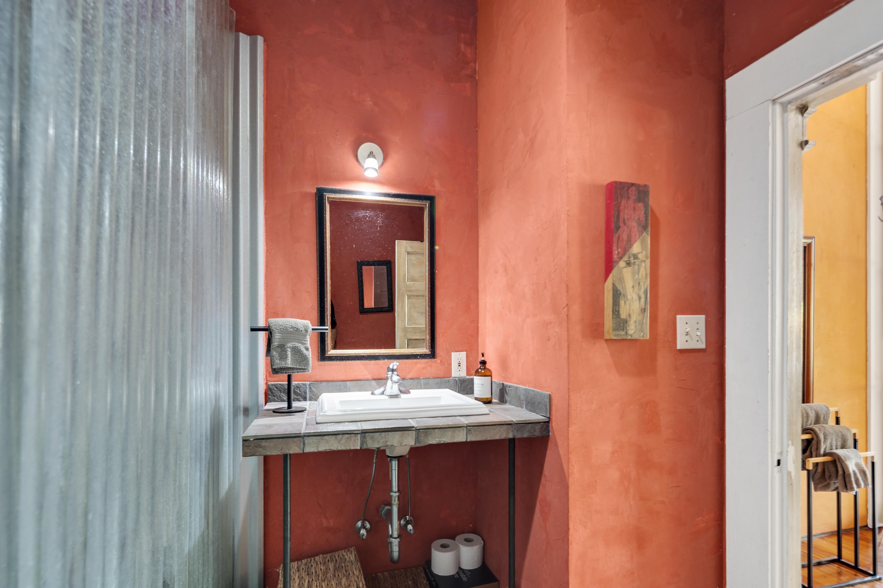 116 South Front Street, Unit 201 Memphis, TN 38103 - Photo 15 of 26 a bathroom with a sink and a mirror