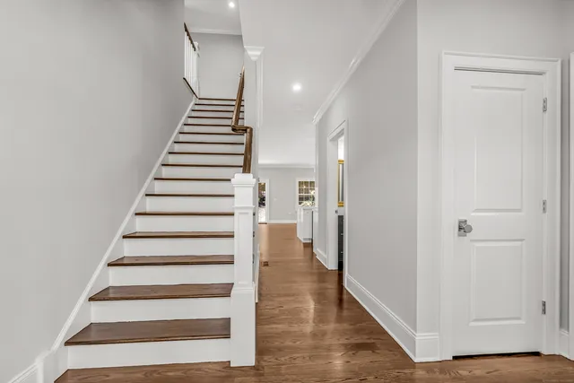a view of entryway with wooden floor