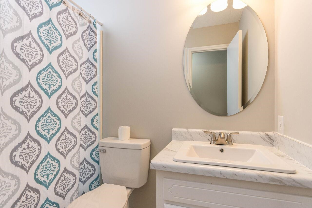 1603 Jeffrey Street Raleigh, NC 27610 - Photo 19 of 28 Bathroom w/ Title Flooring