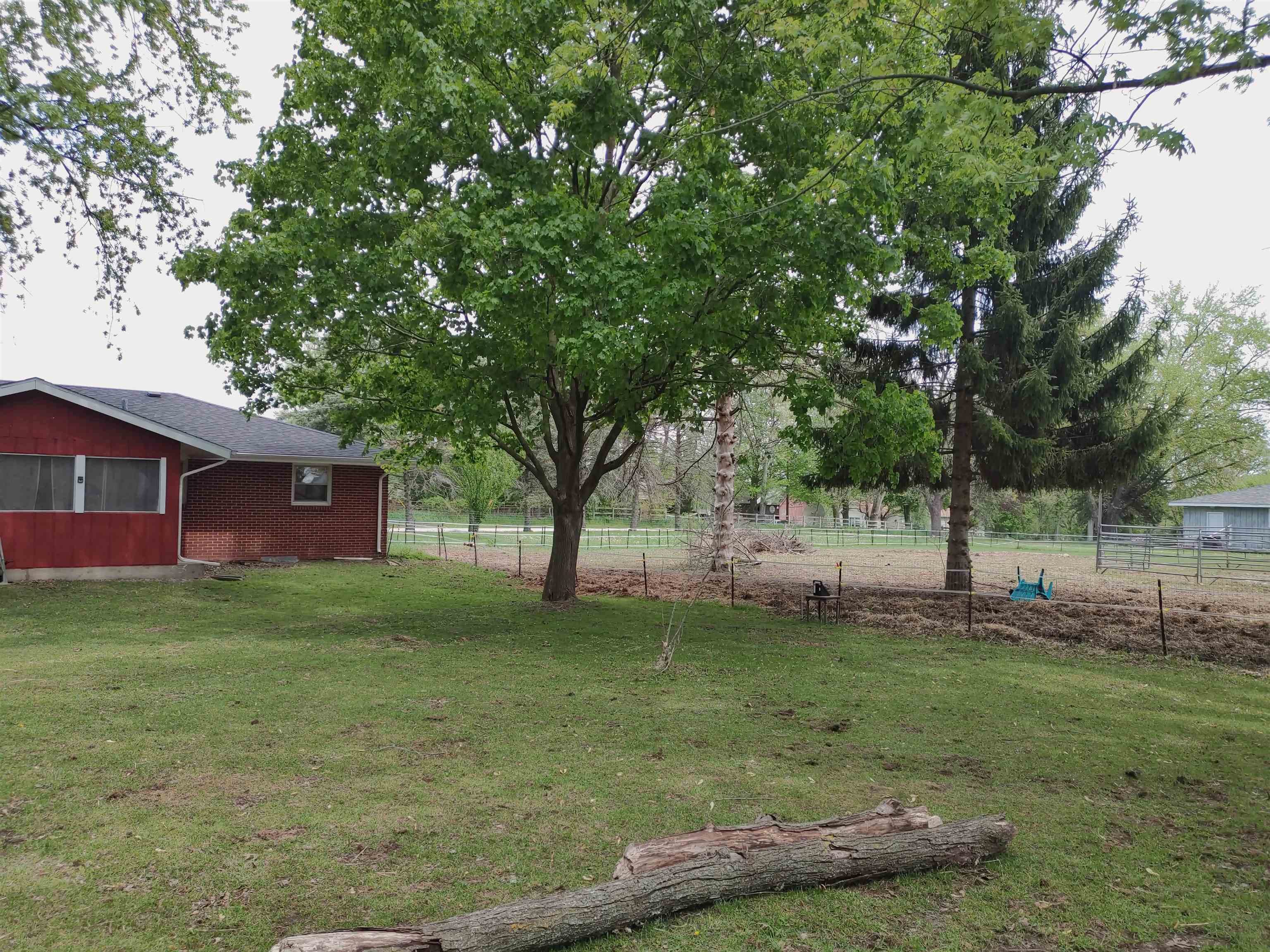 5515 Rotary Road Cherry Valley, IL 61016 - Photo 12 of 31 a view of a yard with a house