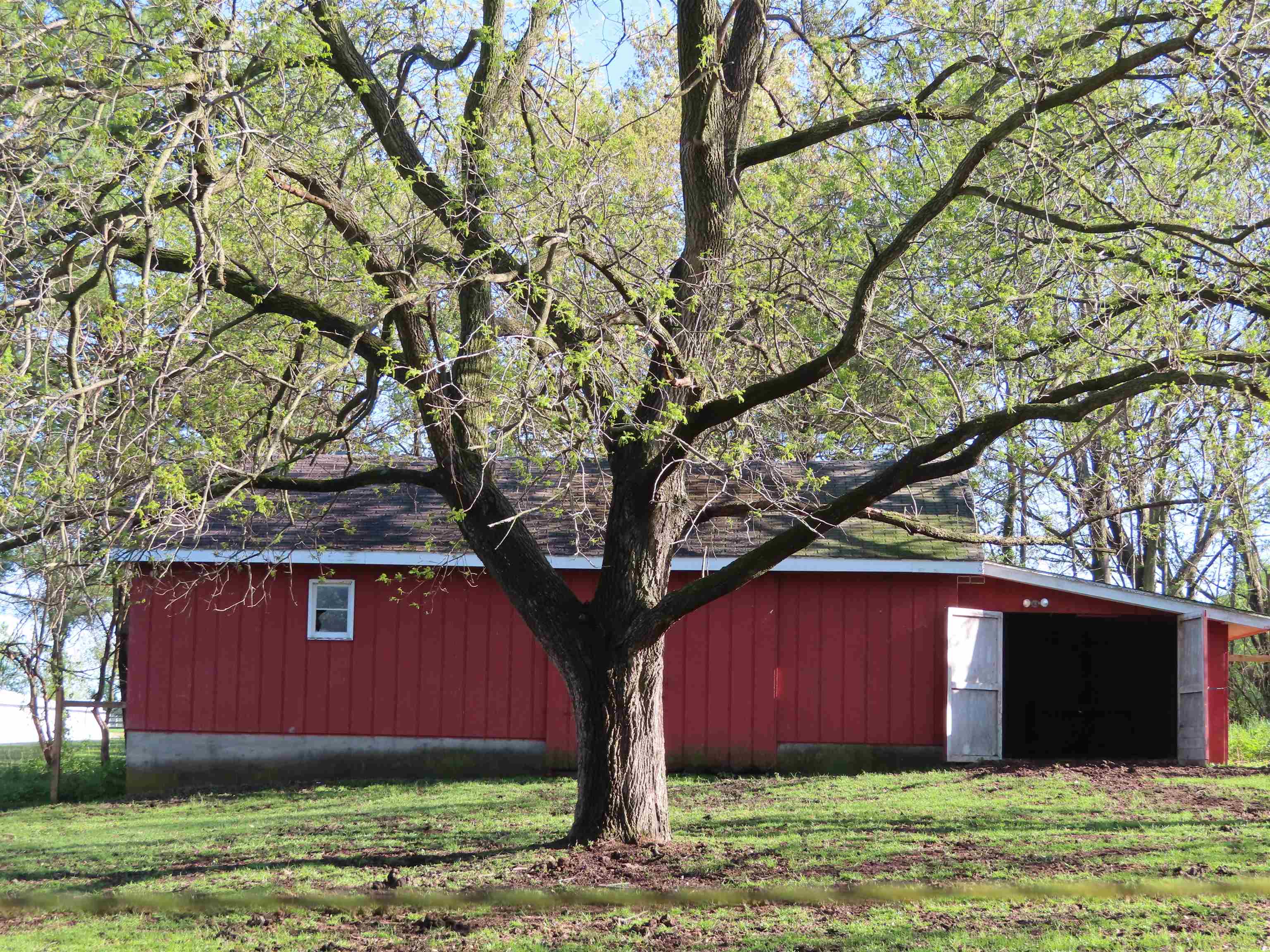 5515 Rotary Road Cherry Valley, IL 61016 - Photo 17 of 31 a view of a backyard of the house
