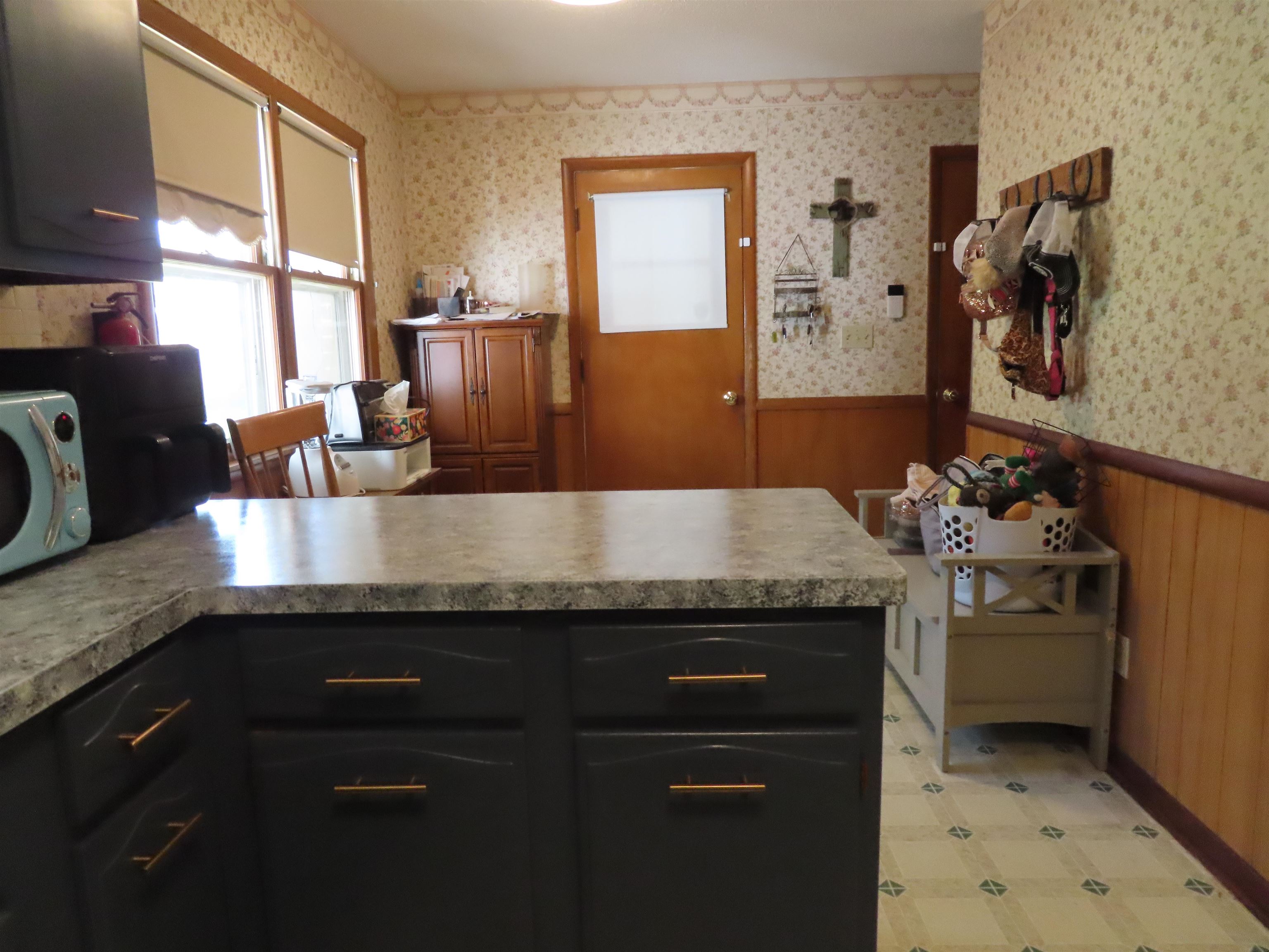 5515 Rotary Road Cherry Valley, IL 61016 - Photo 21 of 31 a kitchen with granite countertop a sink and cabinets