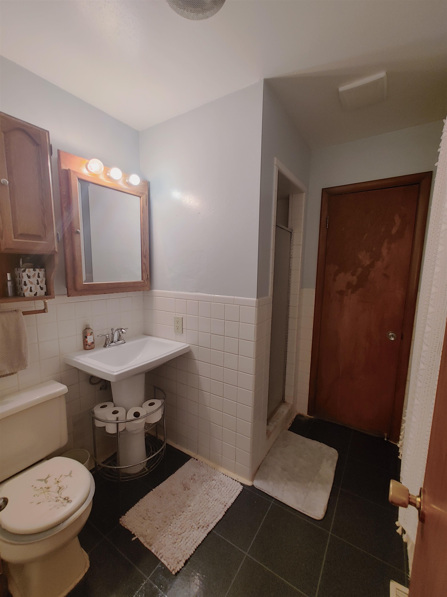 5515 Rotary Road Cherry Valley, IL 61016 - Photo 30 of 31 a bathroom with a sink toilet a mirror and vanity