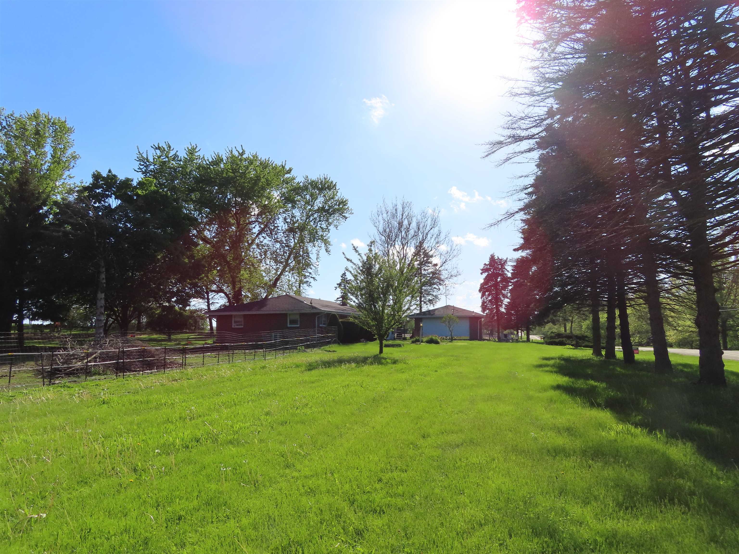 5515 Rotary Road Cherry Valley, IL 61016 - Photo 8 of 31 a view of a park with large trees