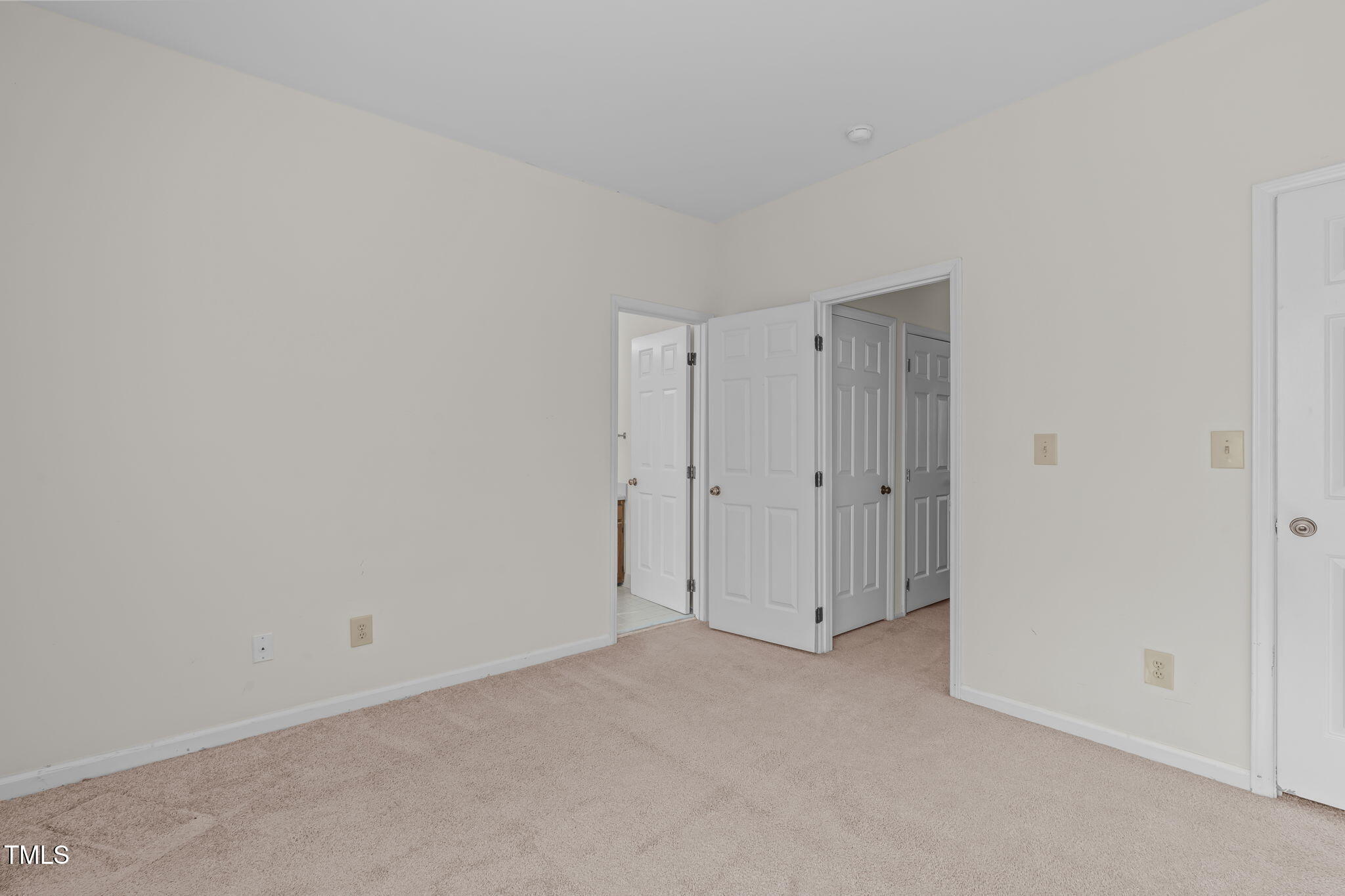 6131 Summer Pointe Place, Unit 101 Raleigh, NC 27606 - Photo 15 of 21 a view of an empty room